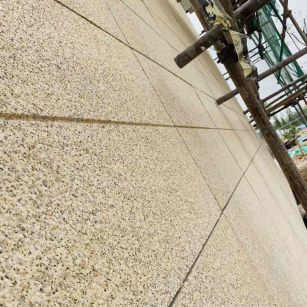 渭南 黄金麻花岗岩荔枝面外墙干挂石材效果示例