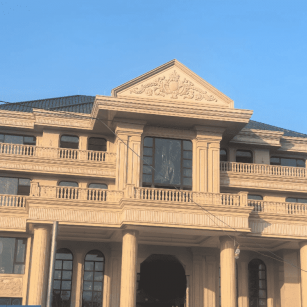 渭南黄金麻别墅外墙干挂石材效果示例