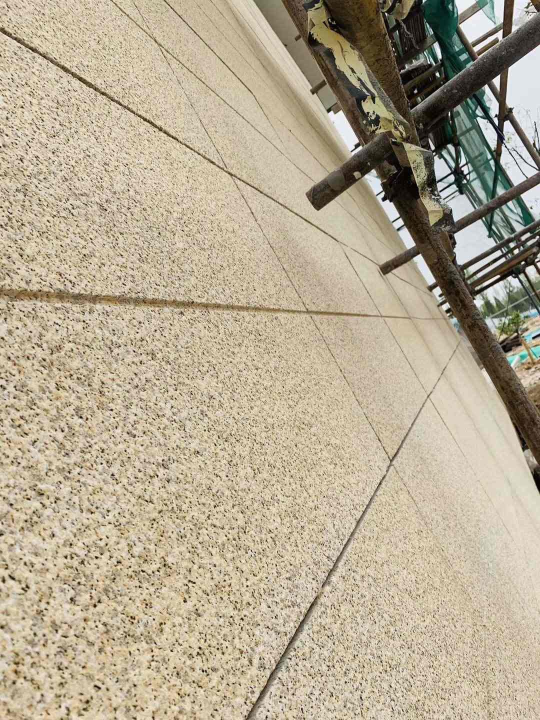 渭南 黄金麻花岗岩荔枝面外墙干挂石材效果示例